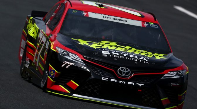 Jones leads opening Charlotte practice; Larson scrapes wall