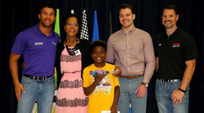 Wallace surprises Lionel Racing contest winner at elementary school
