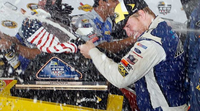 Buescher wins weather-shortened race at Pocono