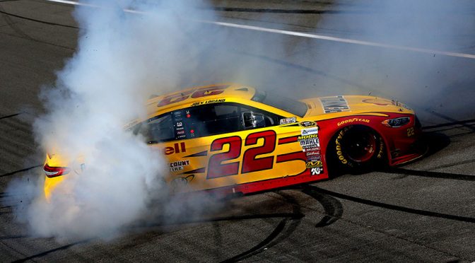 Logano rules in Michigan, lands first win of 2016