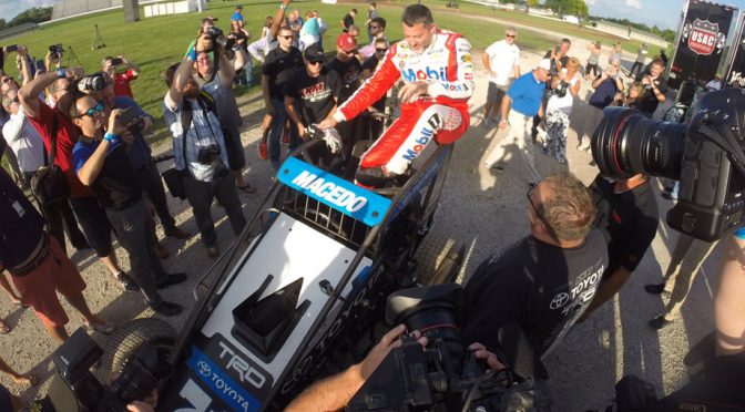 Tony Stewart turns laps on the dirt at Indy