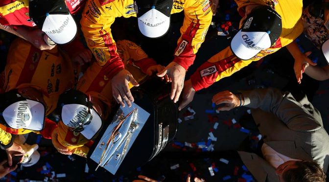 Wear the hat Logano wore in Daytona Victory Lane