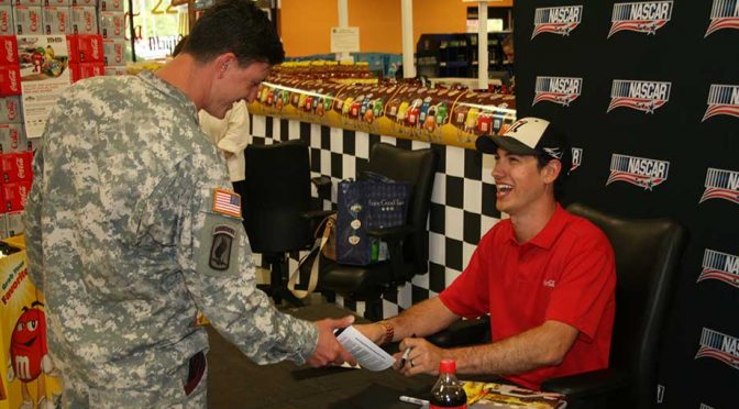 Featured image for Joey Logano greets commissary shoppers at Fort Bragg