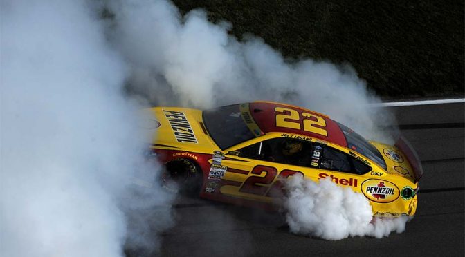 Featured image for Joey Logano wins wild race at Kansas
