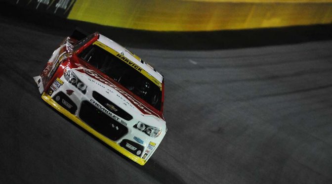 Harvick wins Charlotte night race with restart