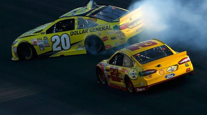 Logano's late bump denies Kenseth, ices Kansas win