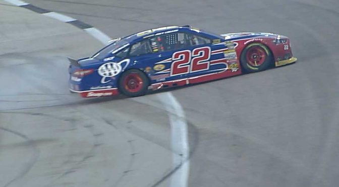 Poor pit stop, flat tire can't halt Logano