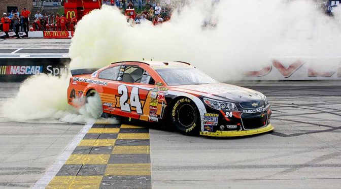 Gordon pulls away for win at Dover