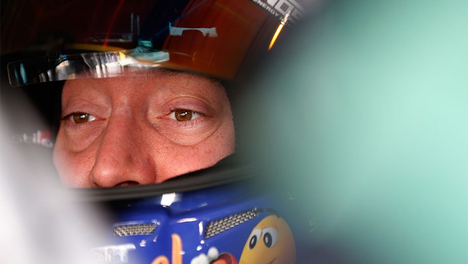 Kyle Busch looks out of his helmet