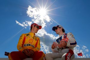 Joey Logano talks with Ryan Blaney
