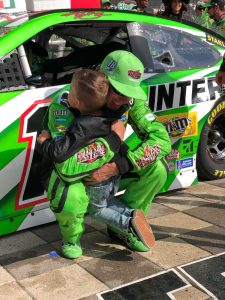 Kyle Busch hugs son, Brexton, after winning in Texas.