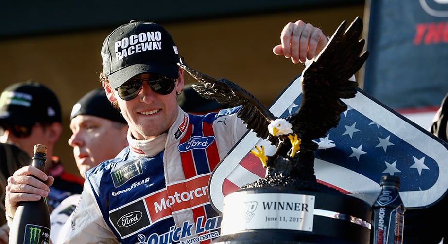 Ryan Blaney, driver of the No. 21 Motorcraft/Quick Lane Tire & Auto Center Ford, celebrates in Victory Lane.