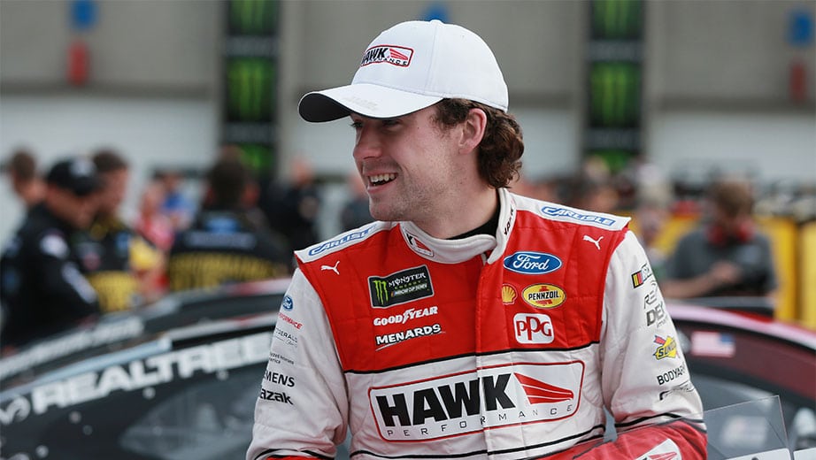 Ryan Blaney smiling in the garage