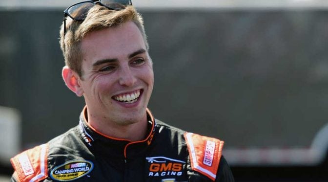 Dalton Sargeant gives a NASCAR salute to his grandfather