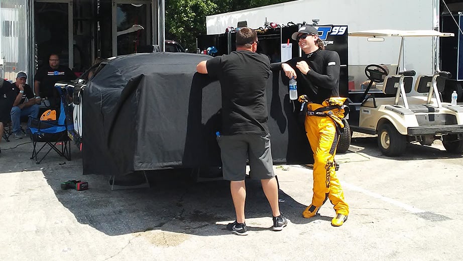 Erik Jones hanging out at his car