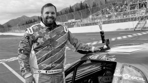 Keith McGee smiles at the track