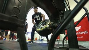 Joshua Patrick changing a tire