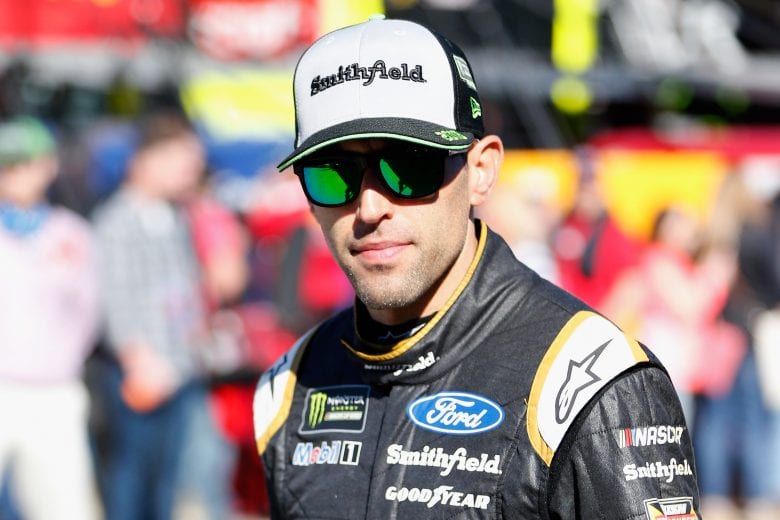 MARTINSVILLE, VA - OCTOBER 27:  Aric Almirola, driver of the #10 Smithfield Ford, walks through the garage area during practice for the Monster Energy NASCAR Cup Series First Data 500 at Martinsville Speedway on October 27, 2018 in Martinsville, Virginia.  (Photo by Brian Lawdermilk/Getty Images) | Getty Images
