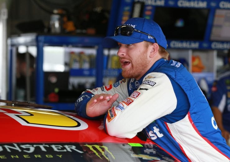 BROOKLYN, MI - AUGUST 11:  Chris Buescher, driver of the #37 Slim Jim Chevrolet, talks with crew members during a fog delayed practice for the Monster Energy NASCAR Cup Series Consmers Energy 400 at Michigan International Speedway on August 11, 2018 in Brooklyn, Michigan.  (Photo by Matt Sullivan/Getty Images) | Getty Images