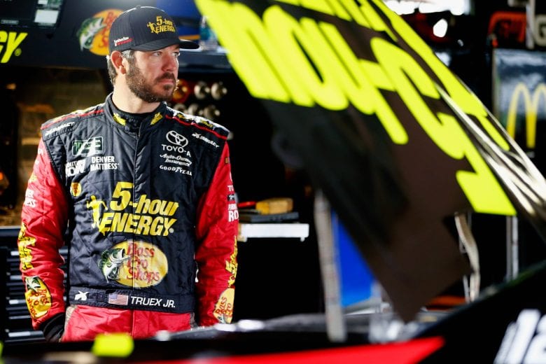DOVER, DE - OCTOBER 05:  Martin Truex Jr., driver of the #78 5-hour ENERGY/Bass Pro Shops Toyota, stands in the garage area during practice for the Monster Energy NASCAR Cup Series Gander Outdoors 400 at Dover International Speedway on October 5, 2018 in Dover, Delaware.  (Photo by Jonathan Ferrey/Getty Images) | Getty Images