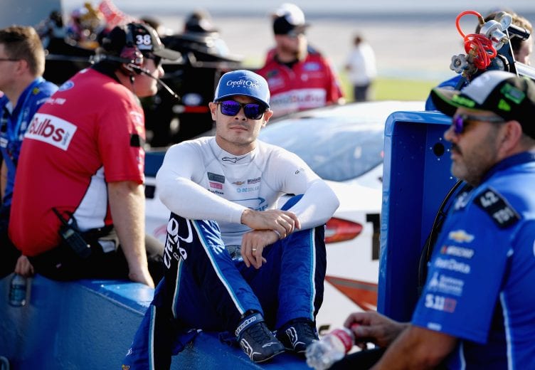 TALLADEGA, AL - OCTOBER 13:  Kyle Larson, driver of the #42 Credit One Bank Chevrolet, sits on pit wall during qualifying for the Monster Energy NASCAR Cup Series 1000Bulbs.com 500 at Talladega Superspeedway on October 13, 2018 in Talladega, Alabama.  (Photo by Josh Hedges/Getty Images) | Getty Images