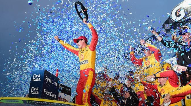 Logano bumps-and-runs Truex Jr. to win at Martinsville, locks in Championship 4 spot