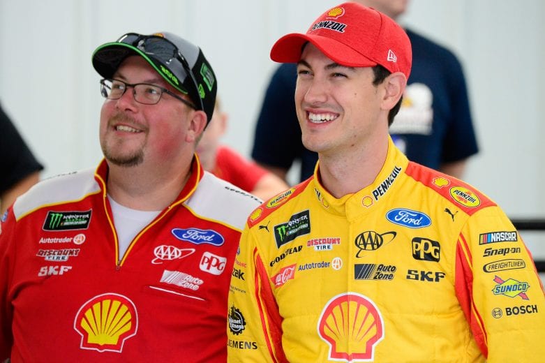 RICHMOND, VA - SEPTEMBER 21:  Joey Logano, driver of the #22 Shell Pennzoil Ford, and crew chief Todd Gordon talk in the garage during practice for the Monster Energy NASCAR Cup Series Federated Auto Parts 400 at Richmond Raceway on September 21, 2018 in Richmond, Virginia.  (Photo by Robert Laberge/Getty Images) | Getty Images