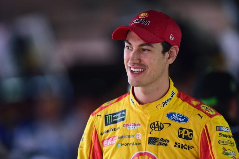 DOVER, DE - OCTOBER 06:  Joey Logano, driver of the #22 Shell Pennzoil Ford, stands in the garage area during practice for the Monster Energy NASCAR Cup Series Gander Outdoors 400 at Dover International Speedway on October 6, 2018 in Dover, Delaware.  (Photo by Jared C. Tilton/Getty Images) | Getty Images