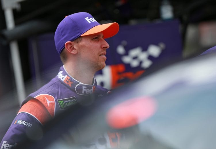 BRISTOL, TN - AUGUST 17:  Denny Hamlin, driver of the #11 FedEx Freight Toyota, stands by his car during practice for the Monster Energy NASCAR Cup Series Bass Pro Shops NRA Night Race at Bristol Motor Speedway on August 17, 2018 in Bristol, Tennessee.  (Photo by Matt Sullivan/Getty Images) | Getty Images