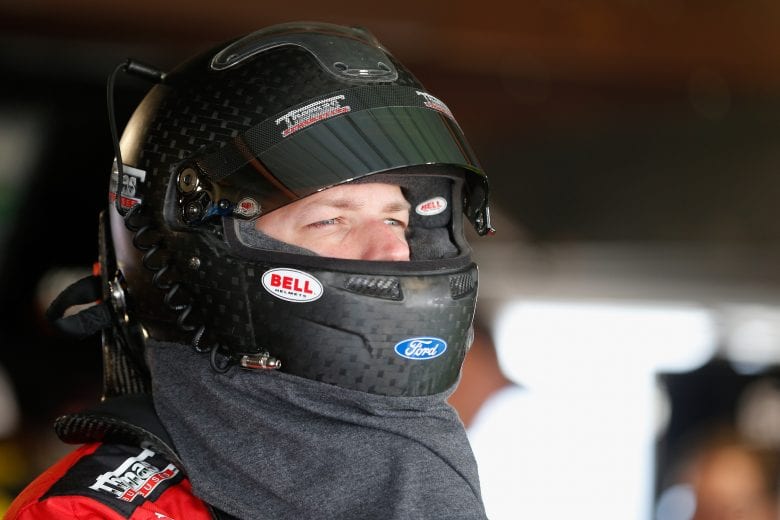 MARTINSVILLE, VA - OCTOBER 27:  Brad Keselowski, driver of the #2 Thomas Built Buses Ford, stands in the garage area during practice for the Monster Energy NASCAR Cup Series First Data 500 at Martinsville Speedway on October 27, 2018 in Martinsville, Virginia.  (Photo by Brian Lawdermilk/Getty Images) | Getty Images