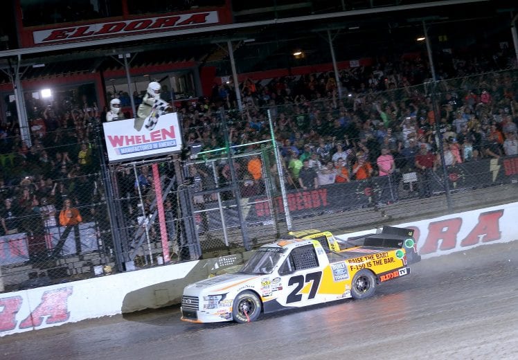 ROSSBURG, OH - JULY 18:  Chase Briscoe, driver of the #27 Ford Ford, takes the checkered flag to win the NASCAR Camping World Truck Series Eldora Dirt Derby at Eldora Speedway on July 18, 2018 in Rossburg, Ohio.  (Photo by Matt Sullivan/Getty Images) | Getty Images