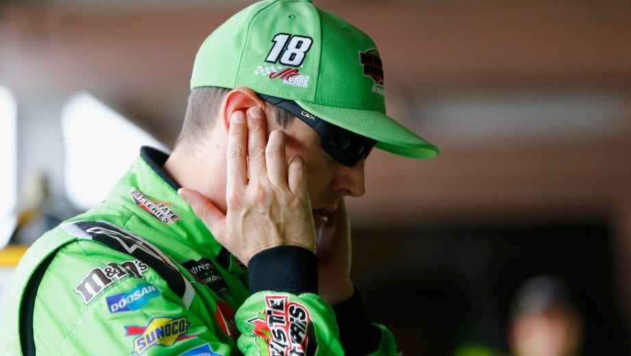DOVER, DE - OCTOBER 05: Kyle Busch, driver of the #18 Interstate Batteries Toyota, stands in the garage area during practice for the Monster Energy NASCAR Cup Series Gander Outdoors 400 at Dover International Speedway on October 5, 2018 in Dover, Delaware. (Photo by Jonathan Ferrey/Getty Images) | Getty Images
