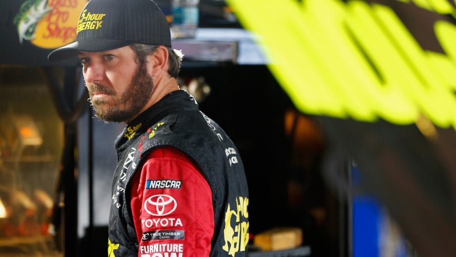 DOVER, DE - OCTOBER 05: Martin Truex Jr., driver of the #78 5-hour ENERGY/Bass Pro Shops Toyota, stands in the garage area during practice for the Monster Energy NASCAR Cup Series Gander Outdoors 400 at Dover International Speedway on October 5, 2018 in Dover, Delaware. (Photo by Jonathan Ferrey/Getty Images) | Getty Images