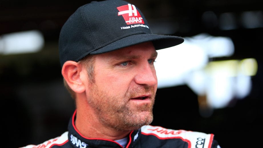 DOVER, DE - OCTOBER 06: Clint Bowyer, driver of the #14 Haas VF1/Rush Truck Centers Ford, stands in the garage area during practice for the Monster Energy NASCAR Cup Series Gander Outdoors 400 at Dover International Speedway on October 6, 2018 in Dover, Delaware. (Photo by Chris Trotman/Getty Images) | Getty Images