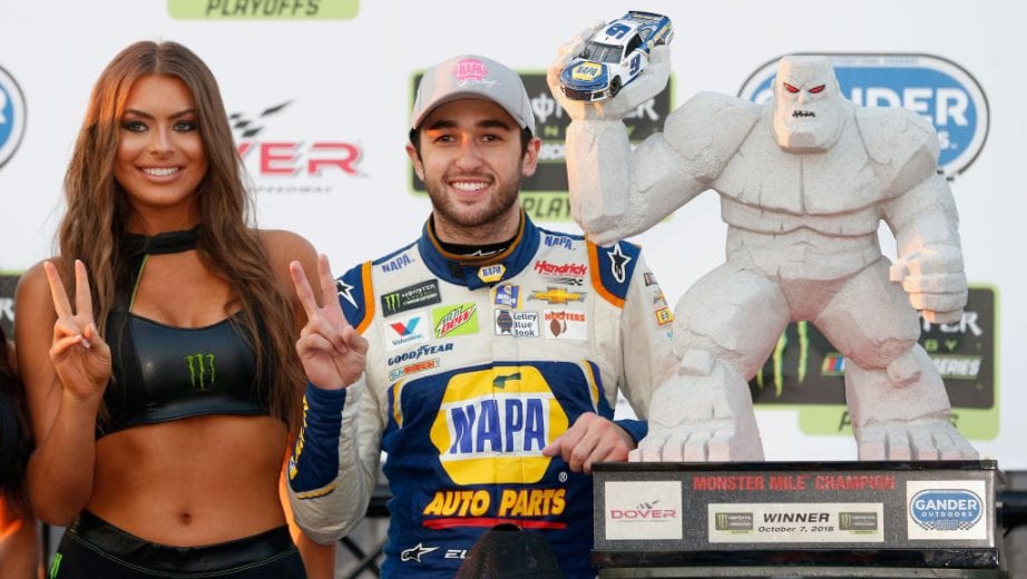 DOVER, DE - OCTOBER 07: Chase Elliott, driver of the #9 NAPA Auto Parts Chevrolet, poses with a Monster girl and the trophy in Victory Lane after winning the Monster Energy NASCAR Cup Series Gander Outdoors 400 at Dover International Speedway on October 7, 2018 in Dover, Delaware. (Photo by Brian Lawdermilk/Getty Images) | Getty Images