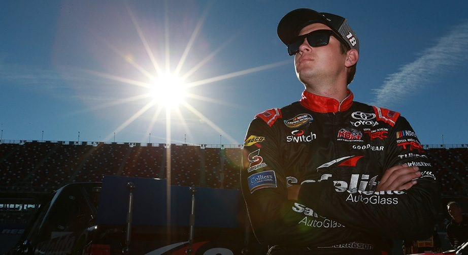 TALLADEGA, AL - OCTOBER 12:  Noah Gragson, driver of the #18 Safelite AutoGlass Toyota, stands by his truck during qualifying for the NASCAR Camping World Truck Series Fr8Auctions 250 at Talladega Superspeedway on October 12, 2018 in Talladega, Alabama.  (Photo by Sean Gardner/Getty Images) | Getty Images