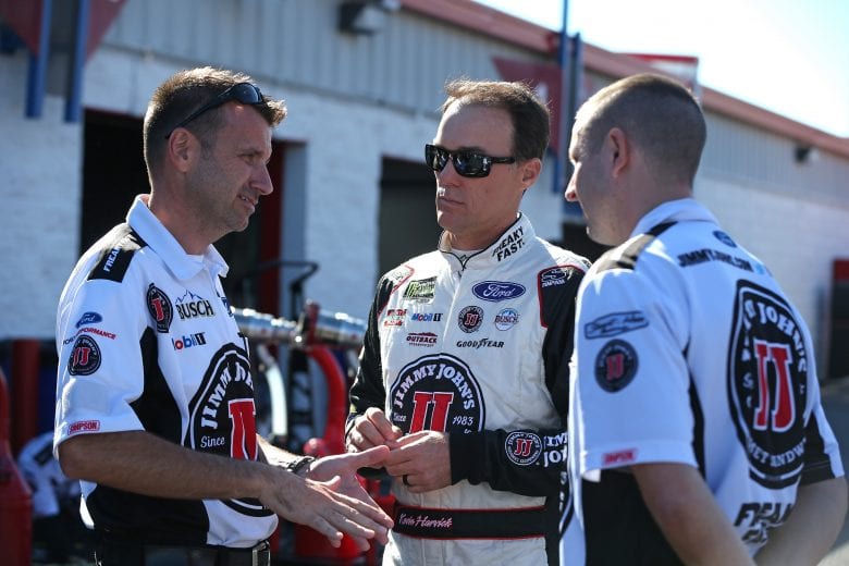 TALLADEGA, AL - OCTOBER 13:  Kevin Harvick, driver of the #4 Jimmy John's Ford, talks with crew members during practice for the Monster Energy NASCAR Cup Series 1000Bulbs.com 500 at Talladega Superspeedway on October 13, 2018 in Talladega, Alabama.  (Photo by Matt Sullivan/Getty Images) | Getty Images