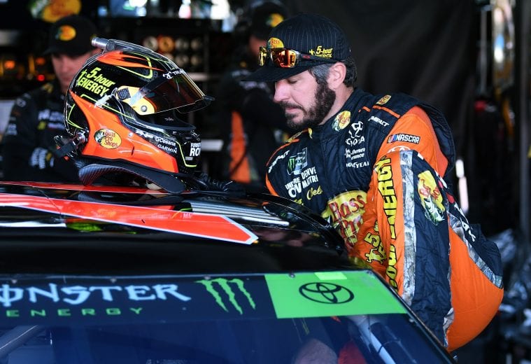 TALLADEGA, AL - OCTOBER 13:  Martin Truex Jr., driver of the #78 Bass Pro Shops/5-hour ENERGY Toyota, climbs into his car during practice for the Monster Energy NASCAR Cup Series 1000Bulbs.com 500 at Talladega Superspeedway on October 13, 2018 in Talladega, Alabama.  (Photo by Josh Hedges/Getty Images) | Getty Images