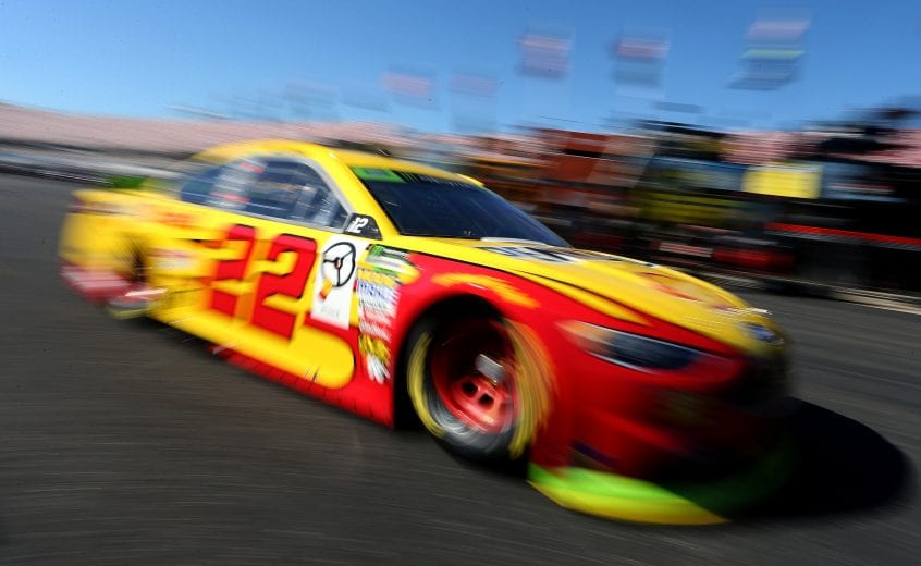 TALLADEGA, AL - OCTOBER 13:  Joey Logano, driver of the #22 Shell Pennzoil Ford, drives through the garage area during practice for the Monster Energy NASCAR Cup Series 1000Bulbs.com 500 at Talladega Superspeedway on October 13, 2018 in Talladega, Alabama.  (Photo by Brian Lawdermilk/Getty Images) | Getty Images