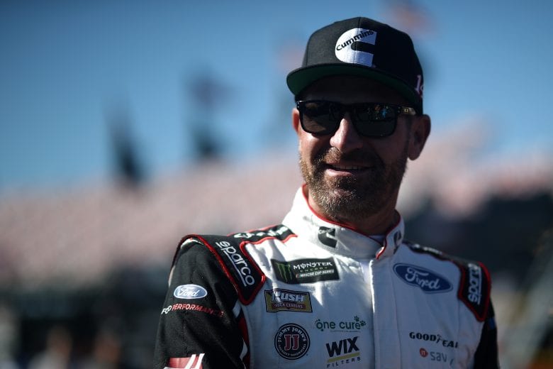 TALLADEGA, AL - OCTOBER 13: Clint Bowyer, driver of the #14 Cummins/Rush Truck Centers Ford, walks through the garage during practice for the Monster Energy NASCAR Cup Series 1000Bulbs.com 500 at Talladega Superspeedway on October 13, 2018 in Talladega, Alabama. (Photo by Chris Graythen/Getty Images) | Getty Images