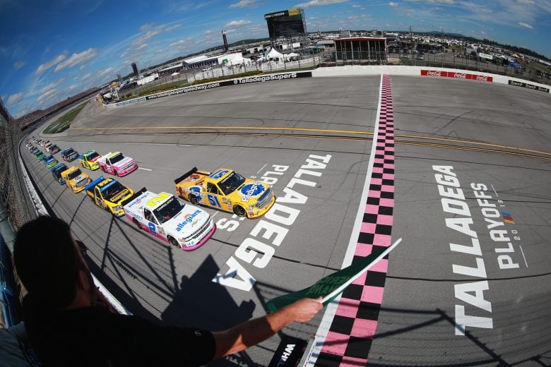 TALLADEGA, AL - OCTOBER 13:  Spencer Gallagher, driver of the #2 Allegiant Chevrolet, and David Gilliland, driver of the #51 Pedigree Toyota, lead the field to the green flag to start the NASCAR Camping World Truck Series Fr8Auctions 250 at Talladega Superspeedway on October 13, 2018 in Talladega, Alabama.  (Photo by Matt Sullivan/Getty Images) | Getty Images