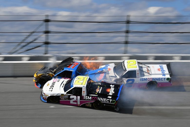 TALLADEGA, AL - OCTOBER 13:  Johnny Sauter, driver of the #21 ISM Connect Chevrolet, Chris Fontaine, driver of the #47 Glenden Enterprises Chevrolet, and Spencer Gallagher, driver of the #2 Allegiant Chevrolet, are involved in an on-track incident during the NASCAR Camping World Truck Series Fr8Auctions 250 at Talladega Superspeedway on October 13, 2018 in Talladega, Alabama.  (Photo by Josh Hedges/Getty Images) | Getty Images