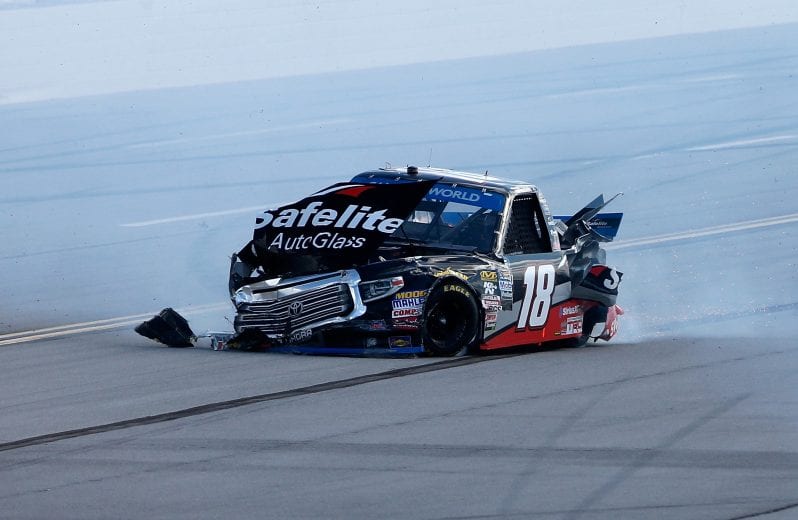 TALLADEGA, AL - OCTOBER 13:  Noah Gragson, driver of the #18 Safelite AutoGlass Toyota, is involved in an on-track incident on the final lap during the NASCAR Camping World Truck Series Fr8Auctions 250 at Talladega Superspeedway on October 13, 2018 in Talladega, Alabama.  (Photo by Brian Lawdermilk/Getty Images) | Getty Images