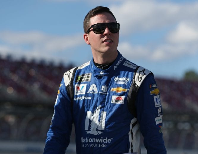 TALLADEGA, AL - OCTOBER 13:  Alex Bowman, driver of the #88 Nationwide Chevrolet, walks to his car during qualifying for the Monster Energy NASCAR Cup Series 1000Bulbs.com 500 at Talladega Superspeedway on October 13, 2018 in Talladega, Alabama.  (Photo by Matt Sullivan/Getty Images) | Getty Images