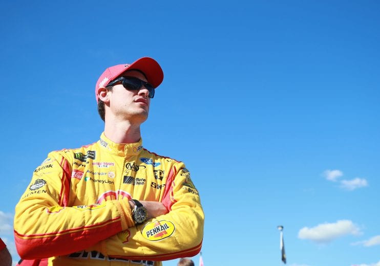 TALLADEGA, AL - OCTOBER 13:  sJoey Logano, driver of the #22 Shell Pennzoil Ford, stands by his car during qualifying for the Monster Energy NASCAR Cup Series 1000Bulbs.com 500 at Talladega Superspeedway on October 13, 2018 in Talladega, Alabama.  (Photo by Matt Sullivan/Getty Images) | Getty Images