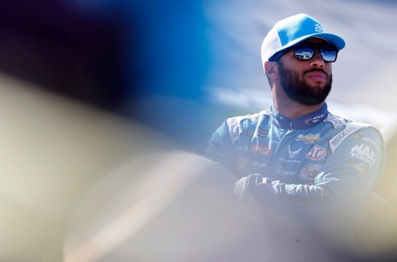 TALLADEGA, AL - OCTOBER 13:  Darrell Wallace Jr., driver of the #43 Medallion Bank/Petty's Garage Chevrolet, stands by his car during qualifying for the Monster Energy NASCAR Cup Series 1000Bulbs.com 500 at Talladega Superspeedway on October 13, 2018 in Talladega, Alabama.  (Photo by Brian Lawdermilk/Getty Images) | Getty Images
