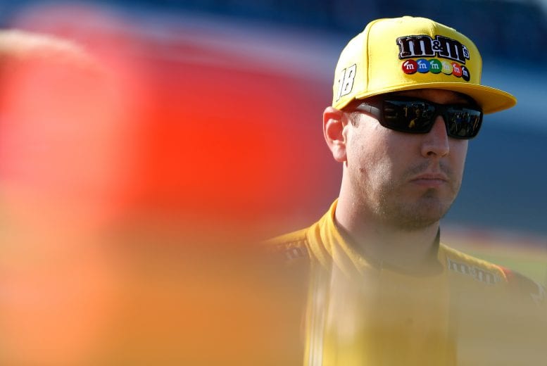 TALLADEGA, AL - OCTOBER 13: Kyle Busch, driver of the #18 M&M's Toyota, stands by his car during qualifying for the Monster Energy NASCAR Cup Series 1000Bulbs.com 500 at Talladega Superspeedway on October 13, 2018 in Talladega, Alabama. (Photo by Brian Lawdermilk/Getty Images) | Getty Images