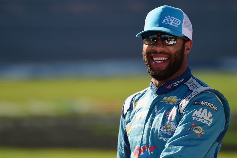 TALLADEGA, AL - OCTOBER 13:  Darrell Wallace Jr., driver of the #43 Medallion Bank/Petty's Garage Chevrolet, stands by his car during qualifying for the Monster Energy NASCAR Cup Series 1000Bulbs.com 500 at Talladega Superspeedway on October 13, 2018 in Talladega, Alabama.  (Photo by Jared C. Tilton/Getty Images) | Getty Images