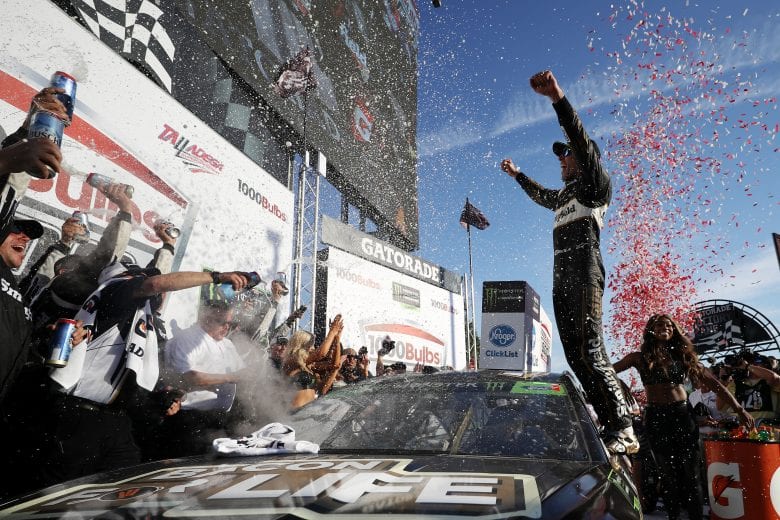 TALLADEGA, AL - OCTOBER 14:  Aric Almirola, driver of the #10 Smithfield Bacon for Life Ford, celebrates in Victory Lane after winning the Monster Energy NASCAR Cup Series 1000Bulbs.com 500 at Talladega Superspeedway on October 14, 2018 in Talladega, Alabama.  (Photo by Chris Graythen/Getty Images) | Getty Images
