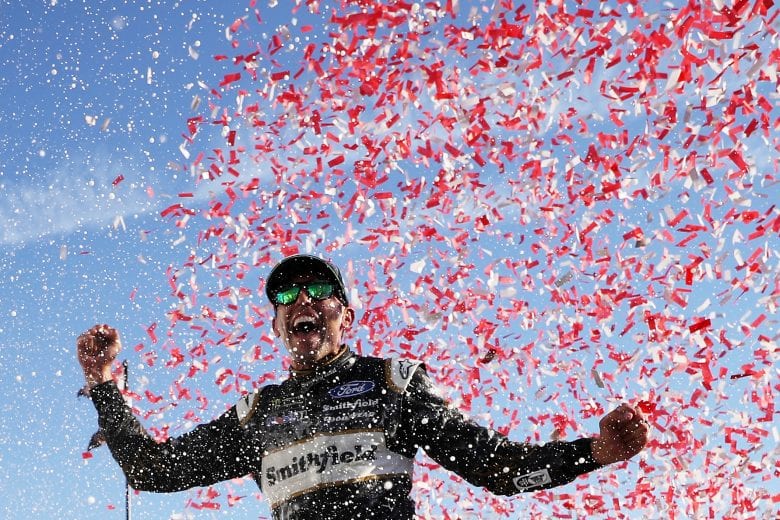 TALLADEGA, AL - OCTOBER 14:  Aric Almirola, driver of the #10 Smithfield Bacon for Life Ford, celebrates in Victory Lane after winning the Monster Energy NASCAR Cup Series 1000Bulbs.com 500 at Talladega Superspeedway on October 14, 2018 in Talladega, Alabama.  (Photo by Chris Graythen/Getty Images) | Getty Images